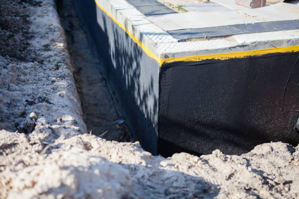 Professional Waterproofing technician working in Philo, IL